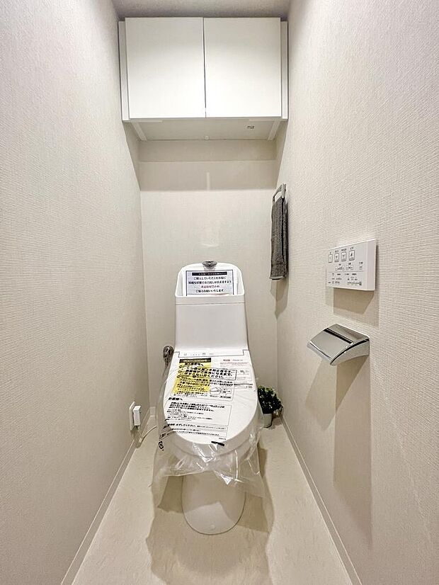 温水洗浄便座付き新規交換のトイレ