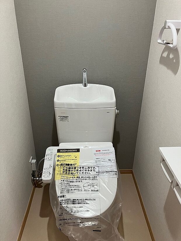 新規で交換したトイレ　（温水洗浄便座付き）