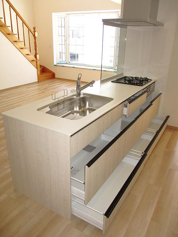 ●オープンキッチンへ交換(人造大理石天板、スライド収納、浄水器付シャワー混合栓)
