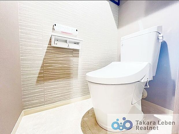 温水洗浄機能付きのトイレは壁掛けリモコンの上位グレードを採用。