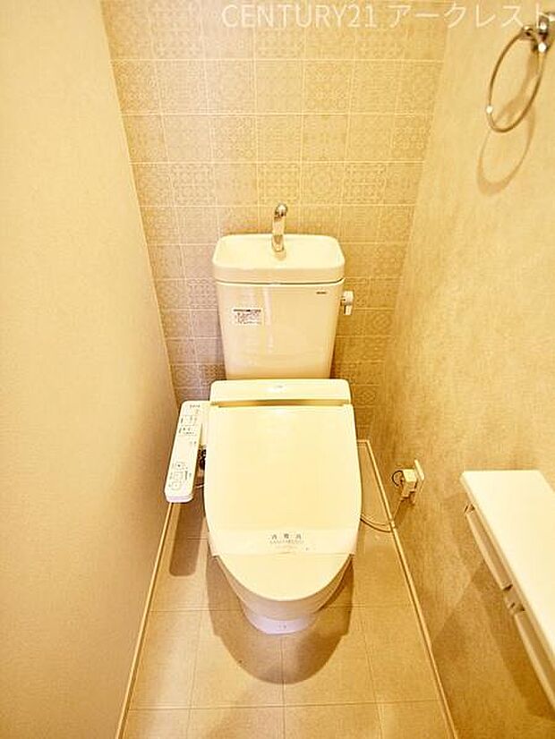 シンプルな内装のスッキリとした1階トイレ