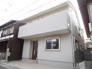 吉田神社参道裏の時計台の見える家