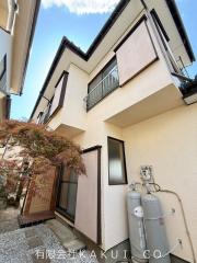 春ひなたと紅葉の家